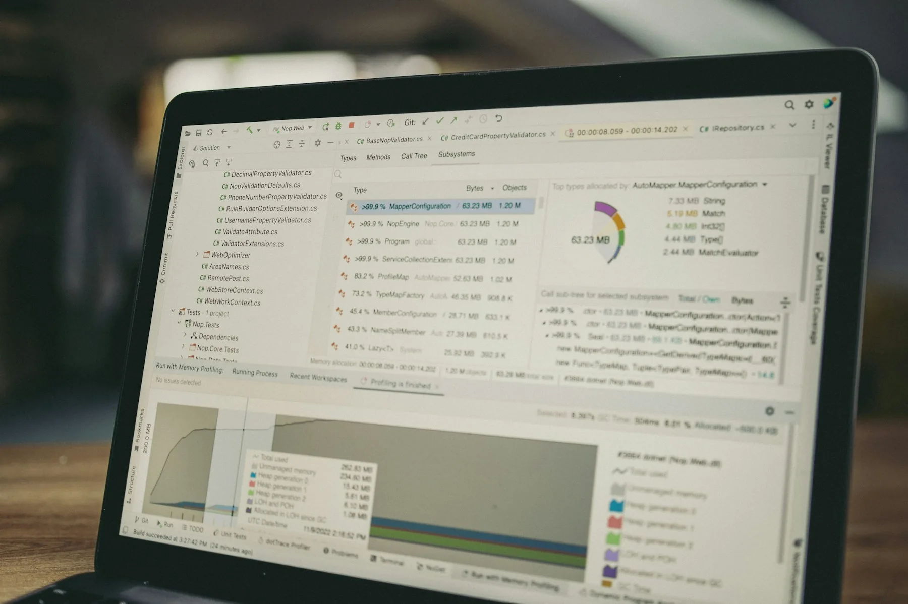 Software performance diagnostics and code displayed on a laptop screen