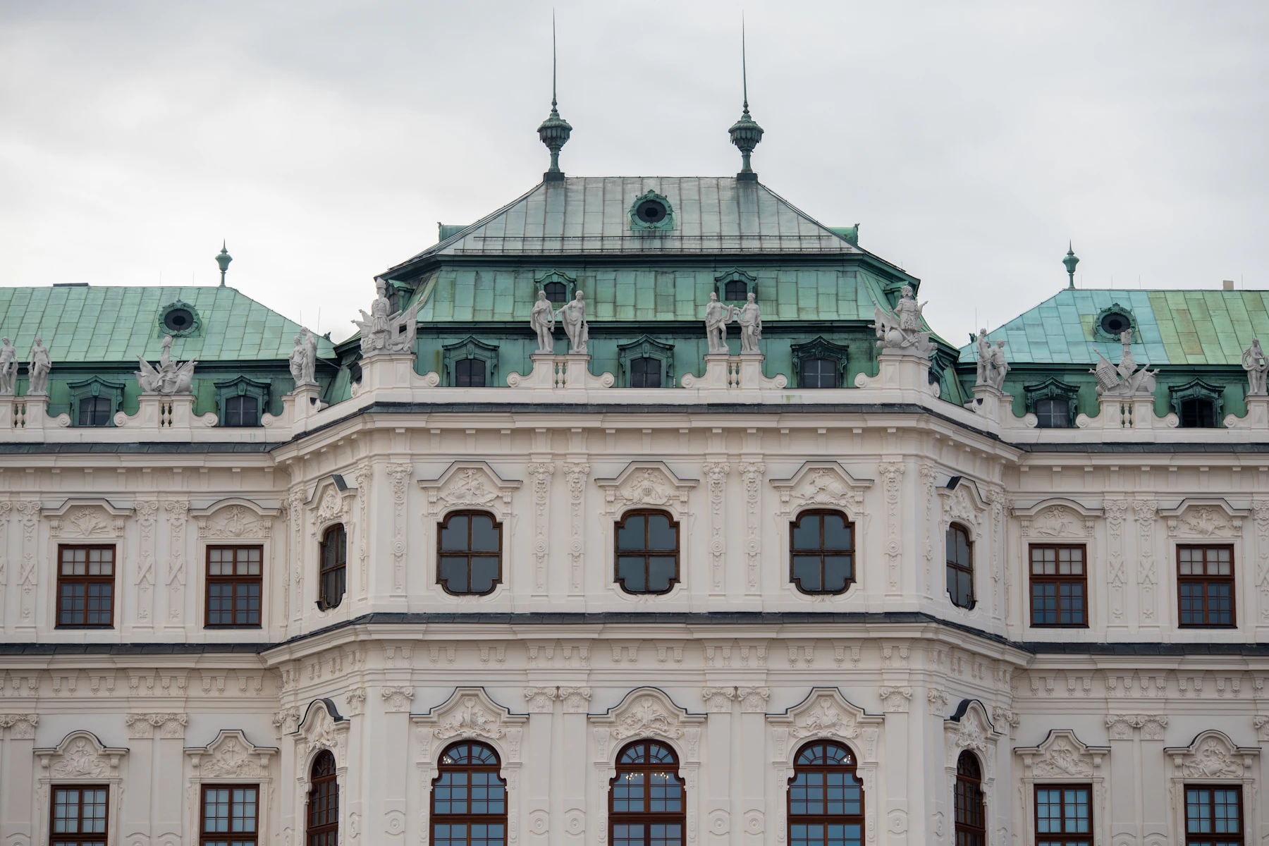 Sculpted facade and green copper roof of Belvedere Palace in Vienna