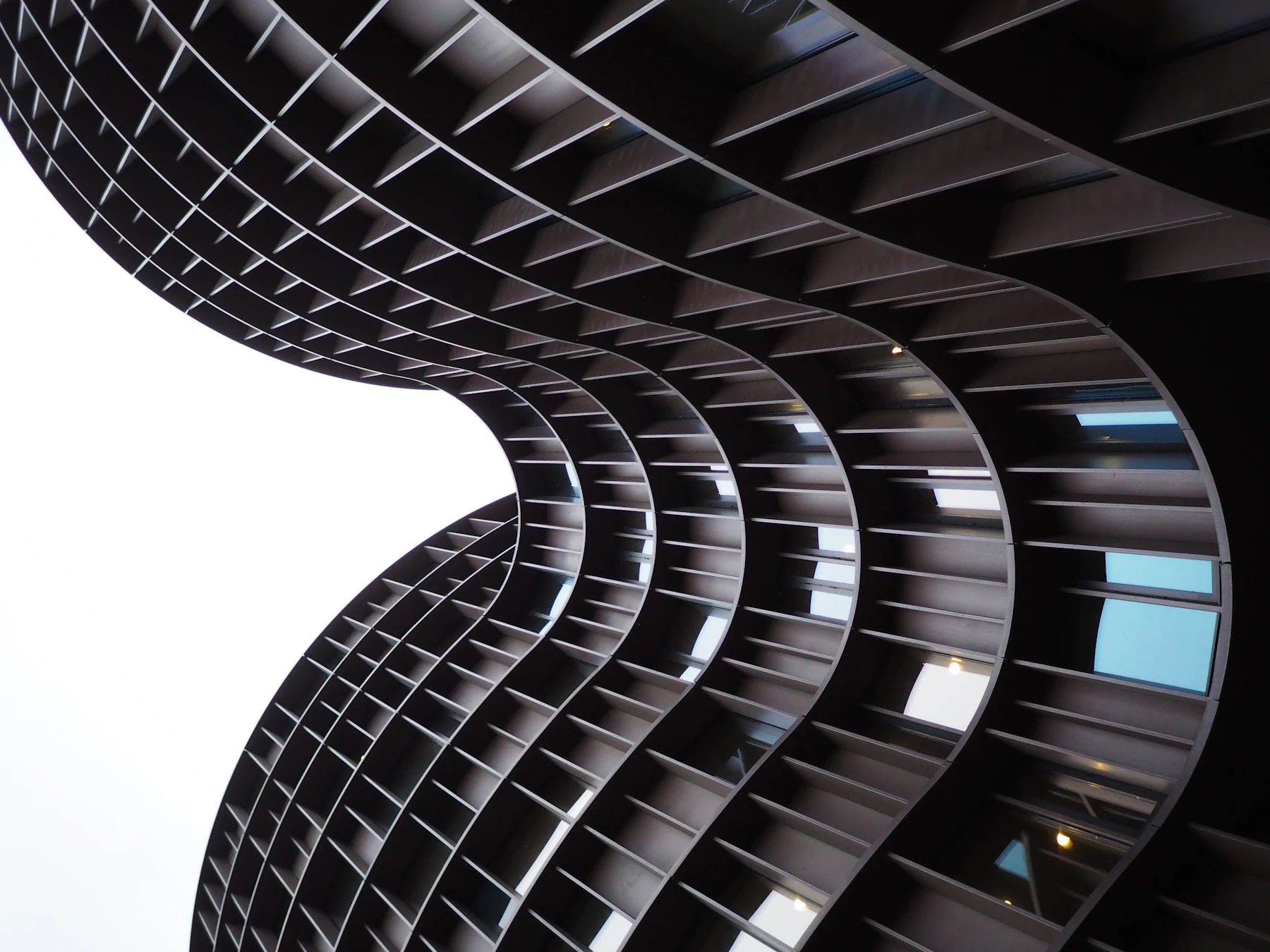 Sculptural curved facades of Axel Towers seen from below in Copenhagen